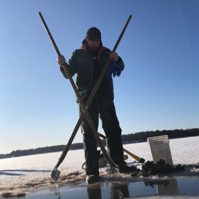 a man water skiing behind a boat
